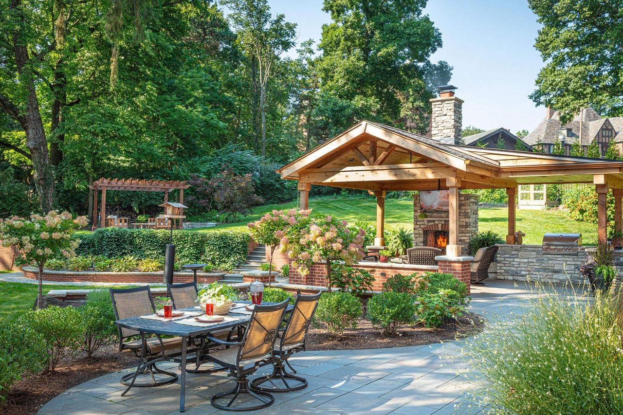 Covered outdoor patio living space with furniture